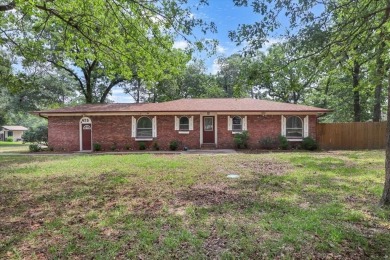 Welcome to your serene retreat in the gated community of on Hide-A-Way Lake Golf Course in Texas - for sale on GolfHomes.com, golf home, golf lot