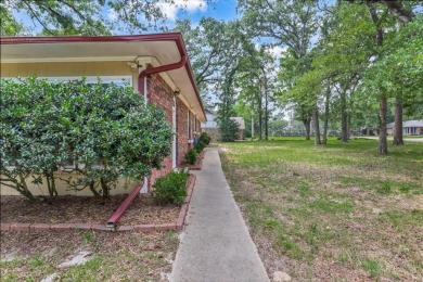 Welcome to your serene retreat in the gated community of on Hide-A-Way Lake Golf Course in Texas - for sale on GolfHomes.com, golf home, golf lot