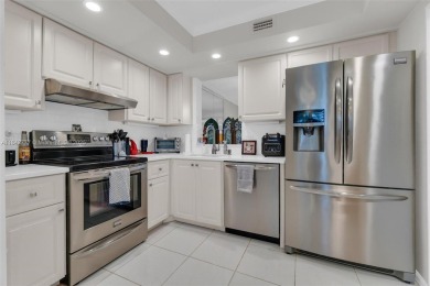 Must See Corner Unit with amazing views 2 Bed/ 2 Bath Condo with on Marina Lakes Golf Course in Florida - for sale on GolfHomes.com, golf home, golf lot