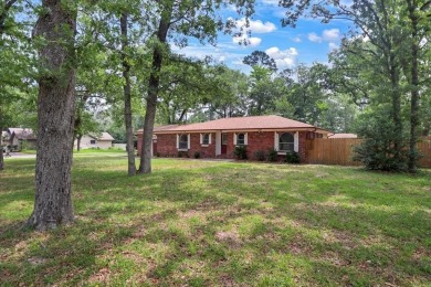 Welcome to your serene retreat in the gated community of on Hide-A-Way Lake Golf Course in Texas - for sale on GolfHomes.com, golf home, golf lot