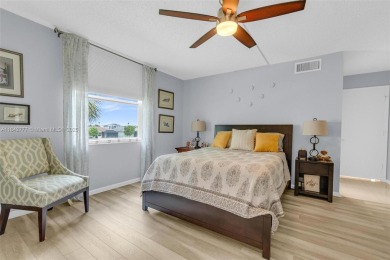 Must See Corner Unit with amazing views 2 Bed/ 2 Bath Condo with on Marina Lakes Golf Course in Florida - for sale on GolfHomes.com, golf home, golf lot