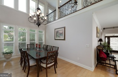Beautifully kept and upgraded! Enter the soaring two story foyer on Eagles Landing Country Club in Georgia - for sale on GolfHomes.com, golf home, golf lot