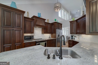 Beautifully kept and upgraded! Enter the soaring two story foyer on Eagles Landing Country Club in Georgia - for sale on GolfHomes.com, golf home, golf lot