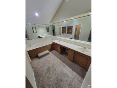 This spacious, nearly 4,700 sq ft house is located in a quiet on Alvamar Orchards in Kansas - for sale on GolfHomes.com, golf home, golf lot
