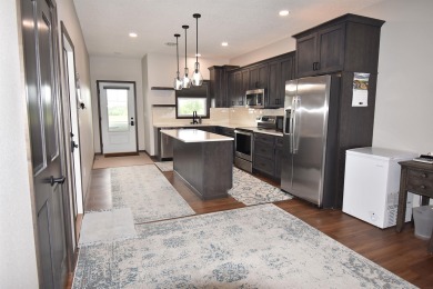 Built in 2021, this one-owner condo offers exceptional quality on Three Elms Golf in Iowa - for sale on GolfHomes.com, golf home, golf lot
