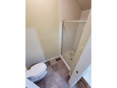 This spacious, nearly 4,700 sq ft house is located in a quiet on Alvamar Orchards in Kansas - for sale on GolfHomes.com, golf home, golf lot
