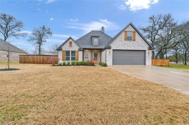 Located in the gated community of Tanglewood Crossing, this on Tanglewood Resort in Texas - for sale on GolfHomes.com, golf home, golf lot