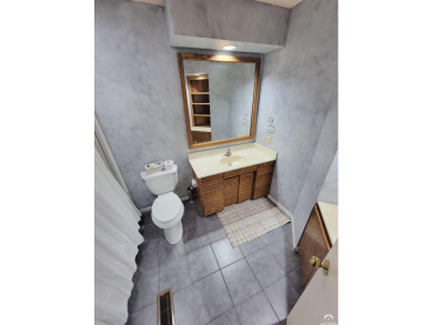 This spacious, nearly 4,700 sq ft house is located in a quiet on Alvamar Orchards in Kansas - for sale on GolfHomes.com, golf home, golf lot