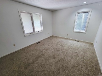 This spacious, nearly 4,700 sq ft house is located in a quiet on Alvamar Orchards in Kansas - for sale on GolfHomes.com, golf home, golf lot