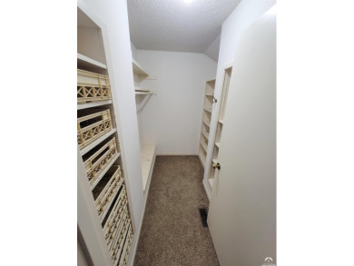 This spacious, nearly 4,700 sq ft house is located in a quiet on Alvamar Orchards in Kansas - for sale on GolfHomes.com, golf home, golf lot