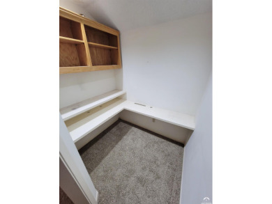 This spacious, nearly 4,700 sq ft house is located in a quiet on Alvamar Orchards in Kansas - for sale on GolfHomes.com, golf home, golf lot