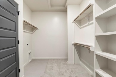 The Woodland II reverse 1.5 story plan offers 5 bedrooms, 3 full on Heritage Park Golf Course in Kansas - for sale on GolfHomes.com, golf home, golf lot