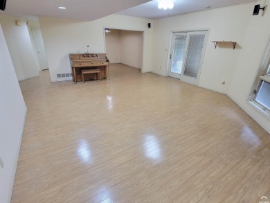 This spacious, nearly 4,700 sq ft house is located in a quiet on Alvamar Orchards in Kansas - for sale on GolfHomes.com, golf home, golf lot
