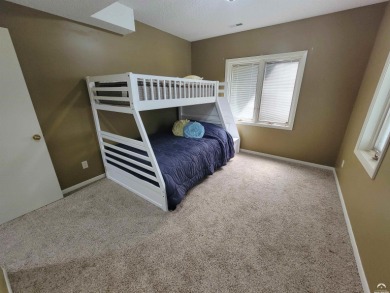 This spacious, nearly 4,700 sq ft house is located in a quiet on Alvamar Orchards in Kansas - for sale on GolfHomes.com, golf home, golf lot