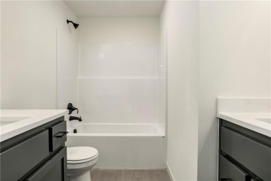 The Woodland II reverse 1.5 story plan offers 5 bedrooms, 3 full on Heritage Park Golf Course in Kansas - for sale on GolfHomes.com, golf home, golf lot