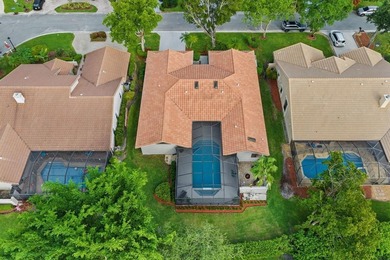 Bright & inviting 4BR/2.5BA pool home in the gated golf on TPC Eagle Trace in Florida - for sale on GolfHomes.com, golf home, golf lot