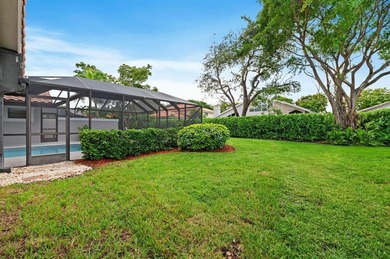 Bright & inviting 4BR/2.5BA pool home in the gated golf on TPC Eagle Trace in Florida - for sale on GolfHomes.com, golf home, golf lot