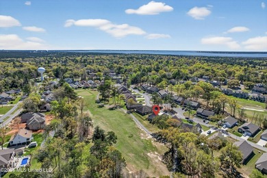 This beautifully maintained 3-bedroom, 2-bath home is perfectly on Diamondhead Country Club in Mississippi - for sale on GolfHomes.com, golf home, golf lot