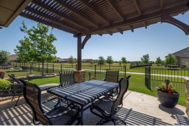 Discover the perfect blend of comfort and style in this stunning on Wildhorse Golf Club of Robson Ranch in Texas - for sale on GolfHomes.com, golf home, golf lot