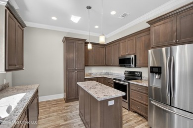 This beautifully maintained 3-bedroom, 2-bath home is perfectly on Diamondhead Country Club in Mississippi - for sale on GolfHomes.com, golf home, golf lot