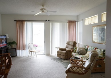 Original snow bird owners in this 2001 attached condo located in on Scepter Golf Club in Florida - for sale on GolfHomes.com, golf home, golf lot