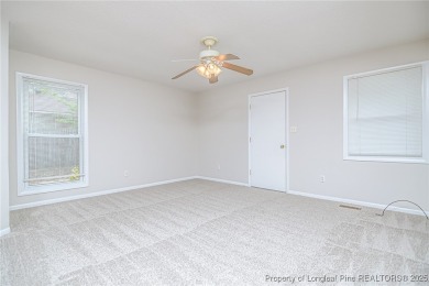 Welcome to this charming 3-bedroom, 2-bath ranch-style home on Hope Mills Golf and Country Club in North Carolina - for sale on GolfHomes.com, golf home, golf lot