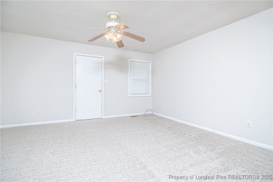 Welcome to this charming 3-bedroom, 2-bath ranch-style home on Hope Mills Golf and Country Club in North Carolina - for sale on GolfHomes.com, golf home, golf lot