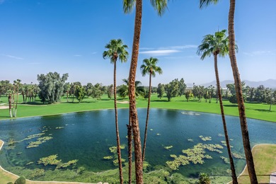 You will enjoy a very open floor plan with newer wide plank tile on Desert Island Golf and Country Club in California - for sale on GolfHomes.com, golf home, golf lot