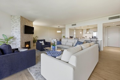 You will enjoy a very open floor plan with newer wide plank tile on Desert Island Golf and Country Club in California - for sale on GolfHomes.com, golf home, golf lot