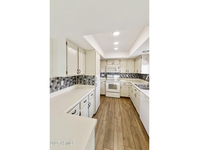 Priced to move! Outstanding curb appeal on this expanded 2BR on Cottonwood Country Club in Arizona - for sale on GolfHomes.com, golf home, golf lot