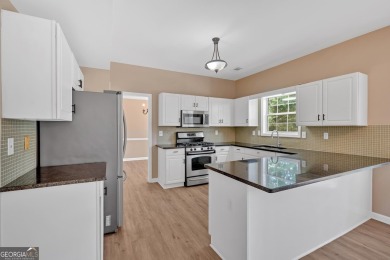 Just Listed - Move-In Ready Gem in Alpharetta! Location: Quiet on The Golf Club of Georgia in Georgia - for sale on GolfHomes.com, golf home, golf lot