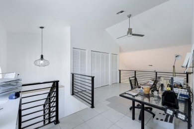 This striking two-bedroom, two-bath plus den Mid-Century design on Heritage Ridge Golf Club in Florida - for sale on GolfHomes.com, golf home, golf lot