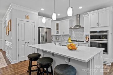 Premium lot with private wooded view! This 5BR/4BA home is on Fox Den Country Club in North Carolina - for sale on GolfHomes.com, golf home, golf lot