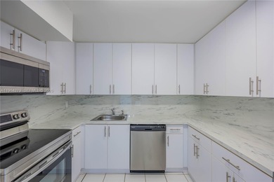 Beautiful 2-bedroom, 2-bath residence on the 8th floor with on Inverrary Country Club in Florida - for sale on GolfHomes.com, golf home, golf lot