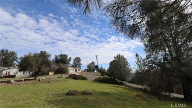 BEAUTIFUL EXPANSIVE CORNER LOT WITH LOVELY LAKE VIEWS! Mostly on The Riviera Hills Golf and Country Club in California - for sale on GolfHomes.com, golf home, golf lot