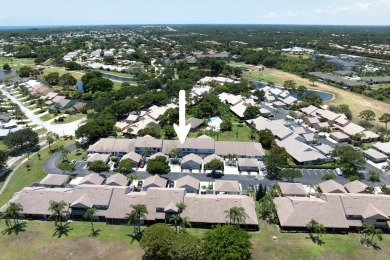 This striking two-bedroom, two-bath plus den Mid-Century design on Heritage Ridge Golf Club in Florida - for sale on GolfHomes.com, golf home, golf lot