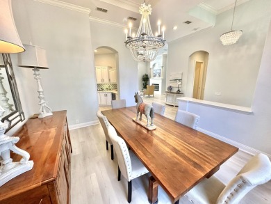 Located on a private end lot and shielded by greenery, this on Sandestin Golf and Beach Resort - Raven in Florida - for sale on GolfHomes.com, golf home, golf lot