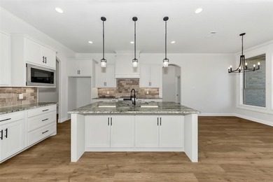 Stunning new construction custom home on a beautiful golf course on Holiday Hills Country Club in Texas - for sale on GolfHomes.com, golf home, golf lot