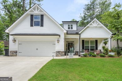 This lovely custom-built home offers a flowing, spacious on Fairfield Plantation Golf and Country Club in Georgia - for sale on GolfHomes.com, golf home, golf lot