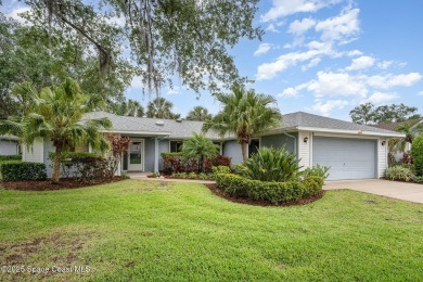 Beautiful expanded Raleigh model with water, golf course, and on Indian River Colony Club in Florida - for sale on GolfHomes.com, golf home, golf lot