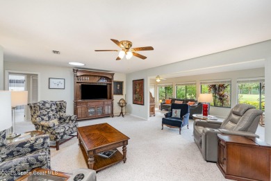 Beautiful expanded Raleigh model with water, golf course, and on Indian River Colony Club in Florida - for sale on GolfHomes.com, golf home, golf lot