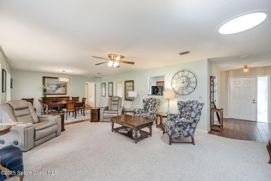 Beautiful expanded Raleigh model with water, golf course, and on Indian River Colony Club in Florida - for sale on GolfHomes.com, golf home, golf lot