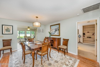 Beautiful expanded Raleigh model with water, golf course, and on Indian River Colony Club in Florida - for sale on GolfHomes.com, golf home, golf lot