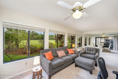 Beautiful expanded Raleigh model with water, golf course, and on Indian River Colony Club in Florida - for sale on GolfHomes.com, golf home, golf lot