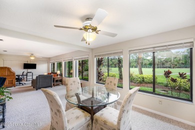 Beautiful expanded Raleigh model with water, golf course, and on Indian River Colony Club in Florida - for sale on GolfHomes.com, golf home, golf lot