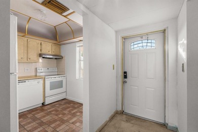 HANDYMAN SPECIAL!!! Golf and water view unit** Association on Oriole Golf and Tennis Club in Florida - for sale on GolfHomes.com, golf home, golf lot