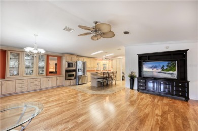 Spacious 2005 Triple-Wide Jacobsen built home situated on a 7 on Maple Leaf Golf and Country Club in Florida - for sale on GolfHomes.com, golf home, golf lot