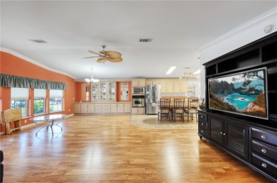 Spacious 2005 Triple-Wide Jacobsen built home situated on a 7 on Maple Leaf Golf and Country Club in Florida - for sale on GolfHomes.com, golf home, golf lot