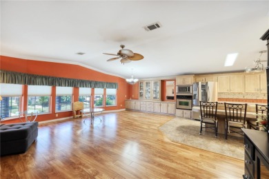 Spacious 2005 Triple-Wide Jacobsen built home situated on a 7 on Maple Leaf Golf and Country Club in Florida - for sale on GolfHomes.com, golf home, golf lot