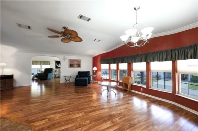Spacious 2005 Triple-Wide Jacobsen built home situated on a 7 on Maple Leaf Golf and Country Club in Florida - for sale on GolfHomes.com, golf home, golf lot